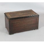 A late 19th century Swiss marquetry inlaid rosewood and simulated rosewood twelve air musical box,