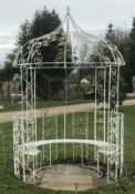 A white painted wrought iron circular gazebo combined seat This lot may be viewed on site at a