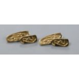 A stylish pair of 9ct gold shaped oval cufflinks decorated in the manner of Archibald Knox, maker'