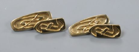 A stylish pair of 9ct gold shaped oval cufflinks decorated in the manner of Archibald Knox, maker'