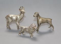 A silver model of a poodle and two other model animals.