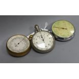 A brass cased pocket barometer and two metal cased military stopwatches