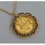 An Edward VII 1908 gold full sovereign in 9ct gold pendant mount, on 9ct gold ropetwist chain.