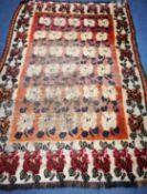 A Turkish floral rug 180 x 120cm