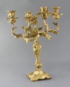 An early Victorian ormolu four light candelabrum, decorated with flowers and scrolls, height 20.