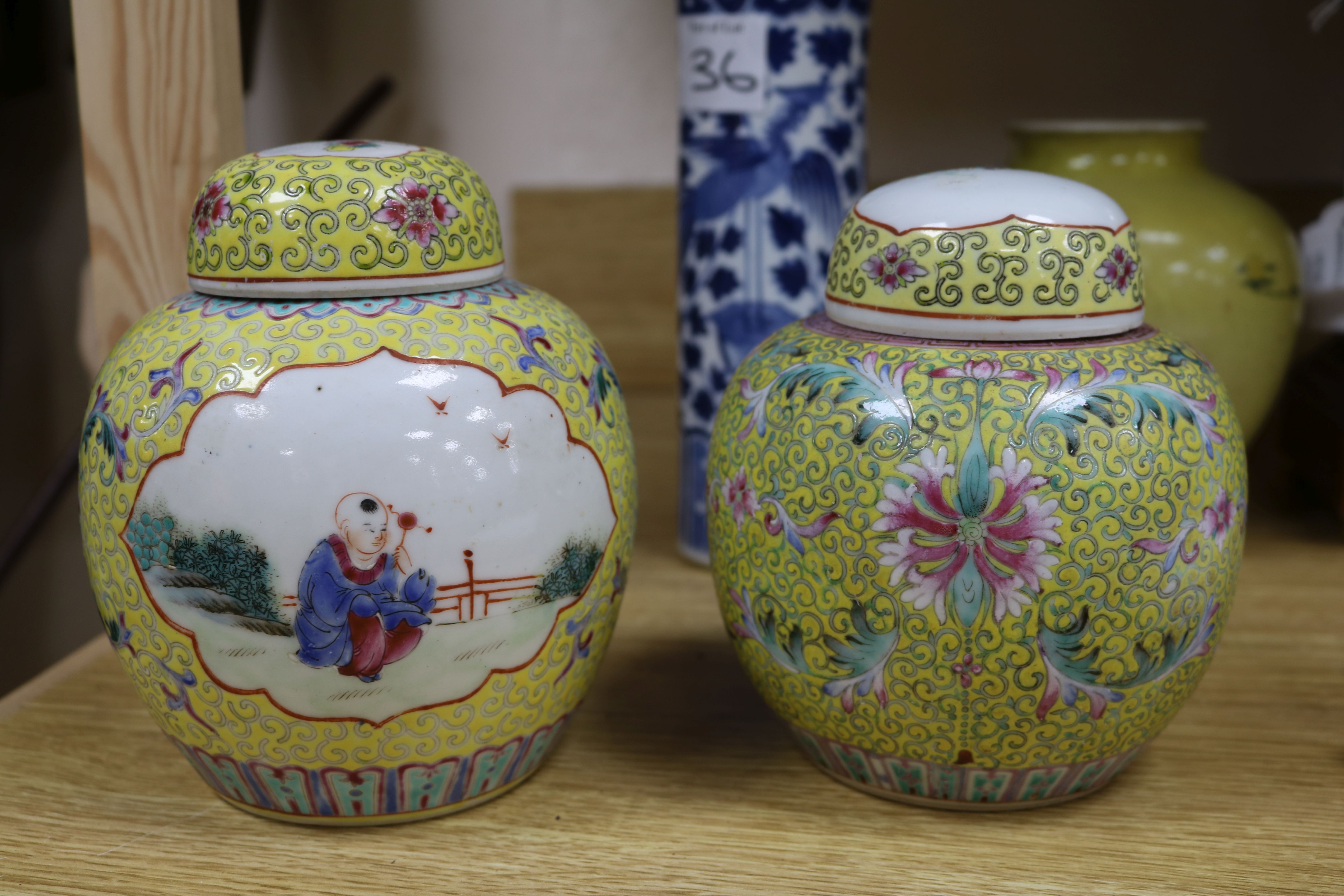 A Chinese enamelled biscuit vase, a blue and white sleeve vase and a pair of jars and covers - Image 2 of 7