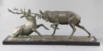Irénée Rochard (1906-1984). A French Art Deco bronzed spelter group of two fighting stags, signed,