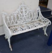 A Victorian Coalbrookedale design white painted cast iron Gothic garden bench W.120cm