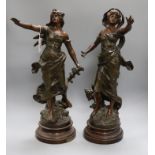 A pair of 19th century French bronzed spelter figures tallest 52cm