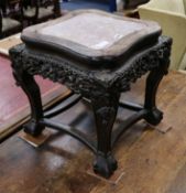 A late 19th century Chinese carved hardwood jardiniere stand, with marble inset top H.46cm