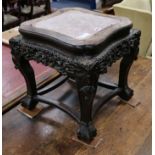 A late 19th century Chinese carved hardwood jardiniere stand, with marble inset top H.46cm