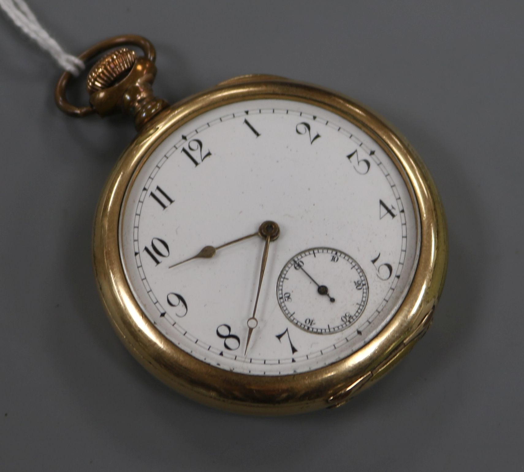 An American Waltham gold plated open face keyless pocket watch.