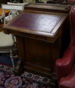 A late Victorian oak Davenport W.64cm