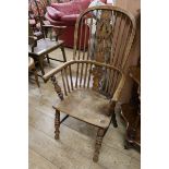 A 19th century ash, alder and elm Windsor armchair