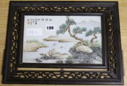 A single Chinese porcelain panel, in carved wood frame panel 15 x 24cm