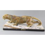 Guy Débe. A French Art Deco patinated spelter model of a crouching leopard, 'Panthere A L'Affut', on