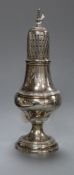 A George III silver pepperette, Crispin Fuller, London, 1793, 15.9cm.