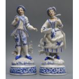 A pair of German porcelain figures height 19cm