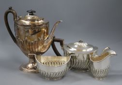 A matched late Victorian demi fluted silver four piece tea and coffee set, London, 1895 & Sheffield,