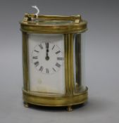 An oval four glass carriage clock