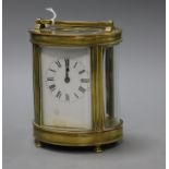 An oval four glass carriage clock