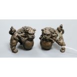 A pair of Chinese bronze temple dogs height 5cm