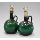 Two 19th century green glass brandy and gin decanters
