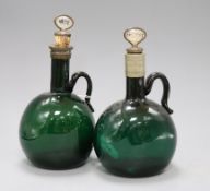 Two 19th century green glass brandy and gin decanters