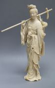 A Chinese ivory carving, late 19th century, He Xiang height 23cm