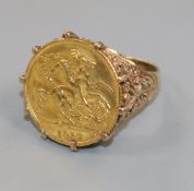 A George V 1915 gold half sovereign, mounted in a 9ct gold ring shank.