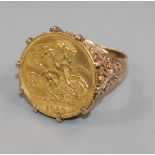 A George V 1915 gold half sovereign, mounted in a 9ct gold ring shank.