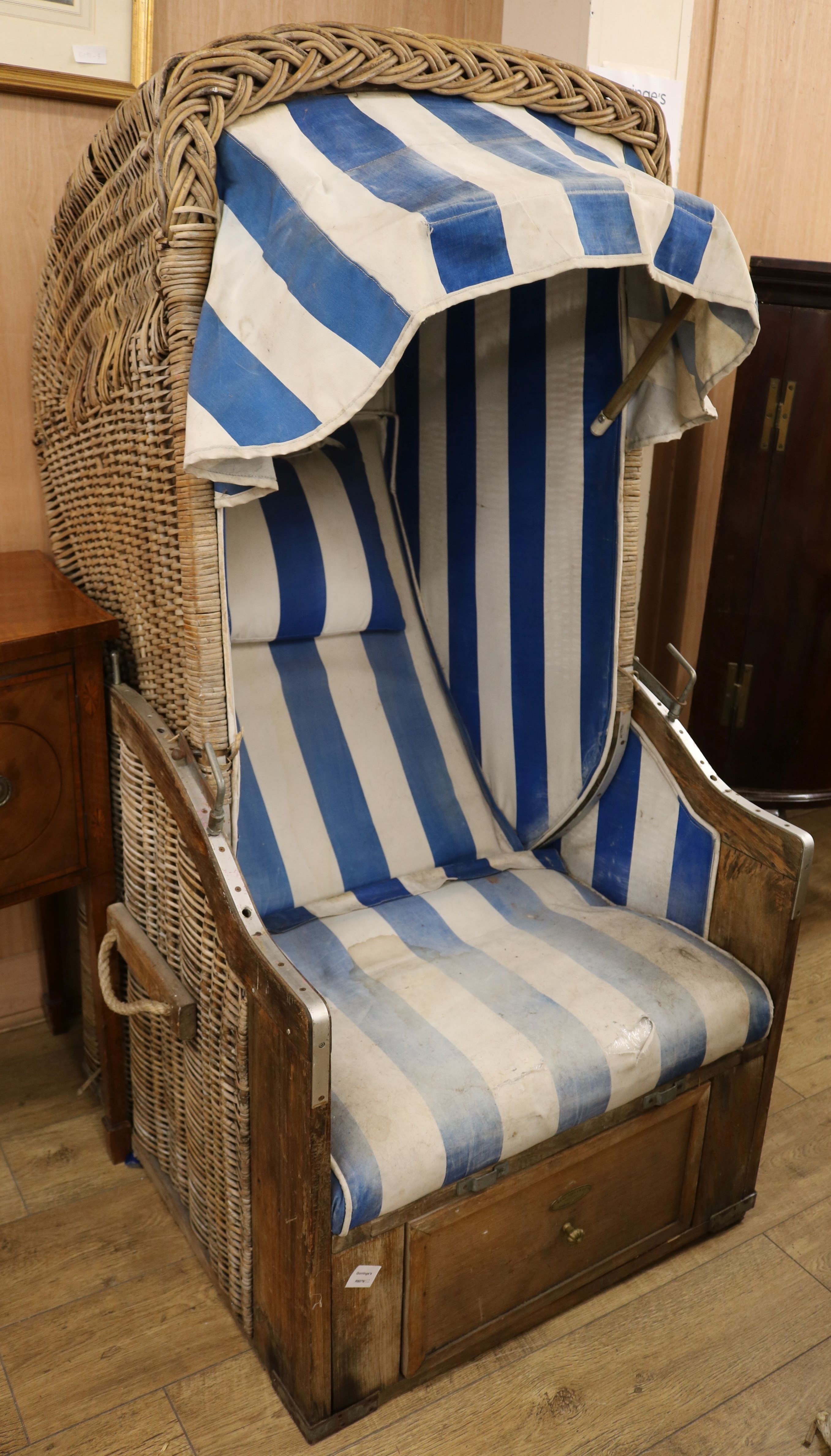 A wicker reclining chair