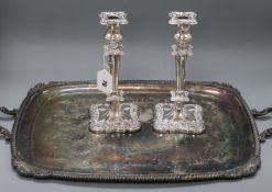 An electroplate tray and a pair of candlesticks