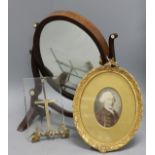A portrait miniature easel frame and a toilet mirror