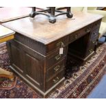 A late Victorian oak pedestal desk W.136cm