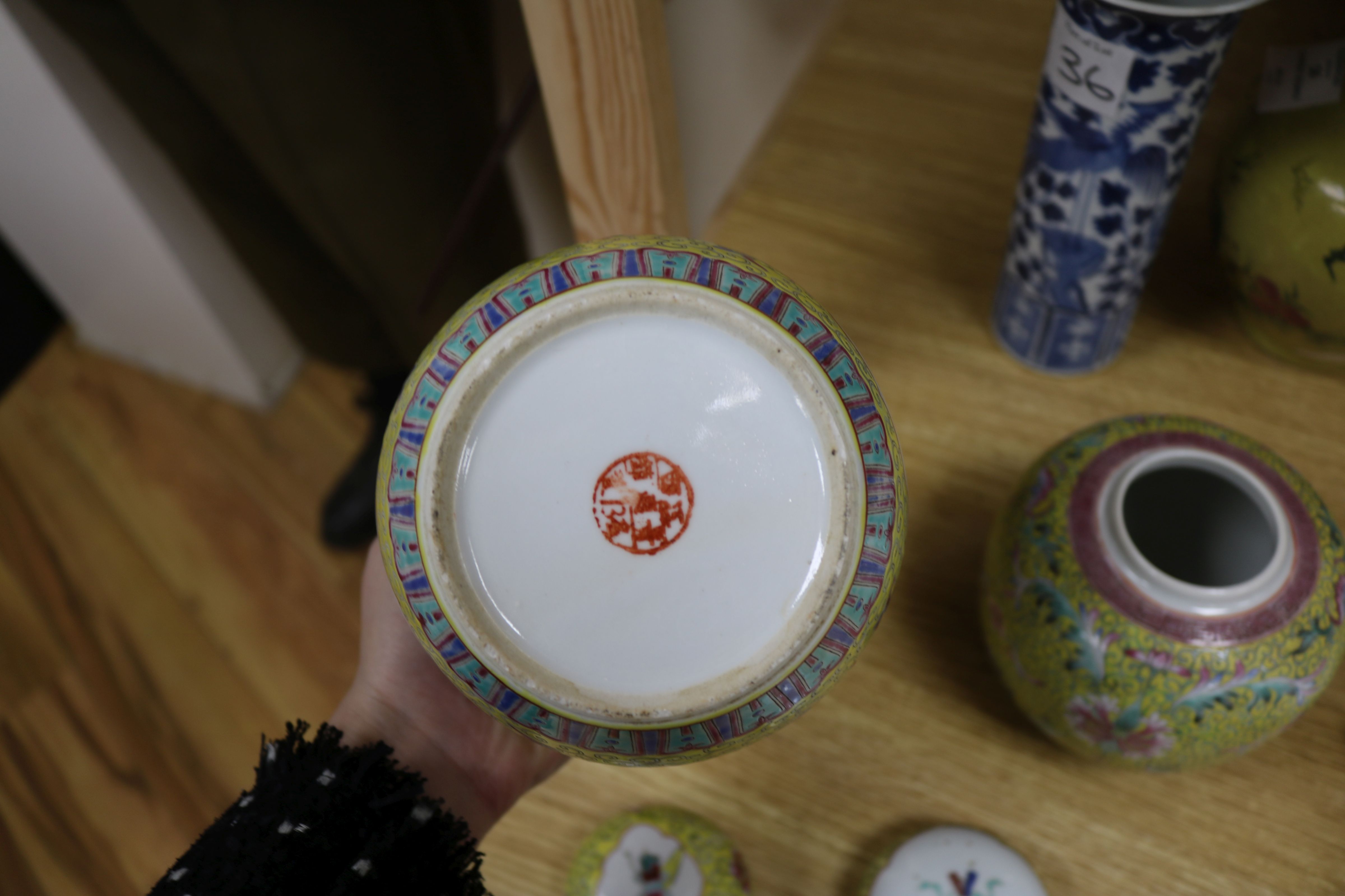 A Chinese enamelled biscuit vase, a blue and white sleeve vase and a pair of jars and covers - Image 4 of 7