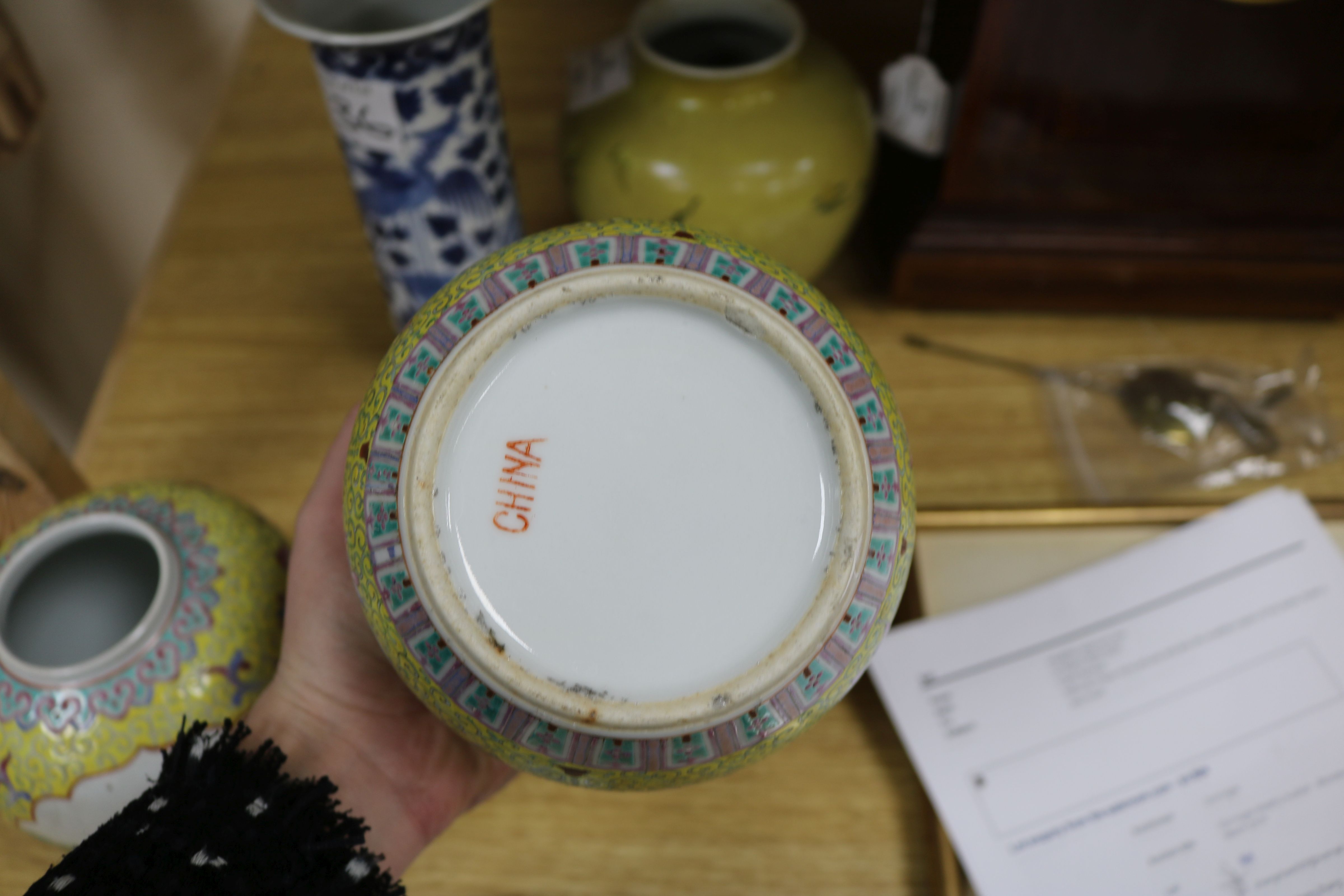 A Chinese enamelled biscuit vase, a blue and white sleeve vase and a pair of jars and covers - Image 5 of 7