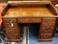 An early 20th century George III style mahogany roll top desk W.122cm