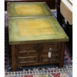 A pair of bass mounted leather topped four drawer coffee tables W.69.5cm