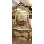 A Louis XV style carved giltwood marble console table, with mirror over W.135cm