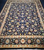 A Kashan rug 330 x 236cm