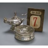 A George V silver and tortoiseshell mounted toilet box, a silver mounted desk calendar and a