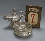 A George V silver and tortoiseshell mounted toilet box, a silver mounted desk calendar and a