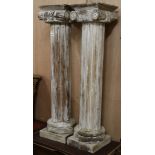 A pair of hardwood pedestal columns and a Continental walnut and marquetry jardiniere H.91.5cm and