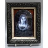 A framed Limoges porcelain plaque of The Virgin Mary