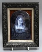 A framed Limoges porcelain plaque of The Virgin Mary