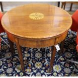 A pair of George III mahogany 'D' shaped folding tea tables W.90cm