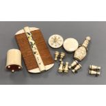 A group of ivory collectables including a comb, scent bottle etc.