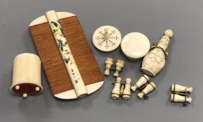 A group of ivory collectables including a comb, scent bottle etc.