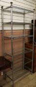 A six shelf metal and glass unit W.80.5cm